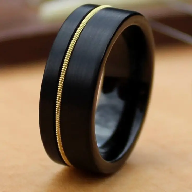 Black Tungsten Ring with Guitar String by Anvil Rings Co. on Etsy