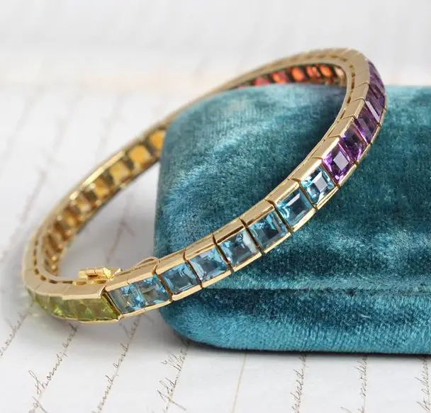 Vintage H. Stern Rainbow Gemstone Tennis Bracelet in 18k Gold from the Eden Collective on