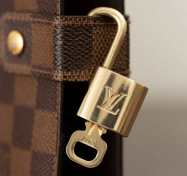 Louis Vuitton Padlock and Key from AuthenticLuxCanada on Etsy