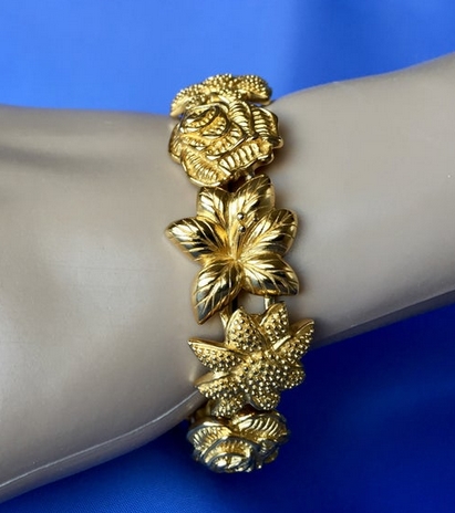 Vintage Monet Gold Plated Flower Design Link Bracelet from MacJewelryDesign on Etsy