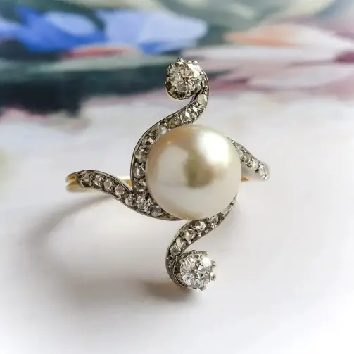 Antique Edwardian Pearl and Diamond Bypass Ring from YourJewelryFinder on Etsy