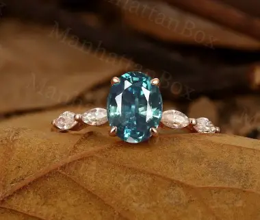 Vintage Oval Cut Teal Sapphire Engagement Ring from ManhattanBox
