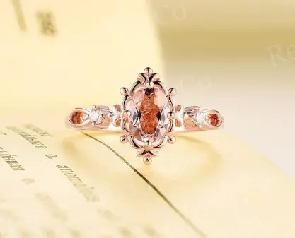 Oval Cut Morganite Engagement Ring from ReindeerHub